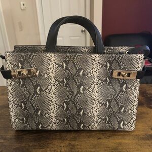 Henri Bendel Elegant Leather Snake Print Handbag. Used only once.  Like new.